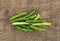 Dried and salted green beans on a board