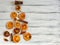 Dried slices of citrus fruits laid out figure holiday tree