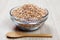 Dried spelt in a bowl on a table