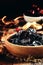 Dried sweet prunes or dark plums in bowl on wooden background, s