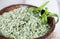 Dried Tarragon in a small bowl