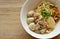 Dried thin rice noodle with pork ball and boiled meat on bowl
