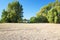 Dried up river bed, beach without water. Low water level of the Rhein dry river landscape, photo On the banks of the Rhine dried o