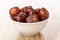 Dried ziziphus chinese date in white bowl on table