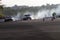 Drifters mercilessly burn the tires of their drift cars