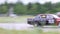 Drifting car on track with puddle at Open Ural Championship Drift 2017