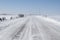 Drifting snow on rural road