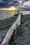 Driftwood Log At Sunset