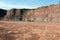 Driller in an open pit mine