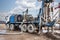 The drilling rig close-up is drilling a well against the background of the cloudy sky. Deep hole drilling. Geological exploration