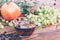 Drink From Dried Hawthorn Berries, A Bunch Of White Grapes And A Pomegranate On The Table Closeup