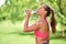 Drink more water, youll feel great. a woman drinking water after her workout.
