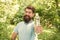 Drink Plenty Of Water. drinking water in forest outdoor with sunset nature on background. Bearded man with water bottle