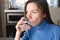 Drink plenty of water from the virus, Covid-19 Pandemic Coronavirus. Girl drinks water from a glass