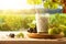 Drink on table with grape bunches and vineyard field