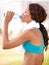 Drinking water, black woman and fitness outdoor with drink after exercise and workout. Female person, profile and