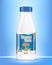 Drinking yogurt bottle with oats on blue background