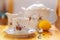 Drinks, relaxation and tea party concept - tea-set of cup, pot, spoon, lemon and saucer