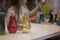 Drinks in shiny popular glassware in the form of electric light bulb on the bar counter, in the background the blurred