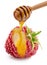 Dripping honey on raspberry isolated on a white background