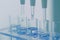 Dripping Liquid from Pipette into Test Tube in Laboratory, Light Airy Environment Test Tubes