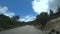 Drive along a winding asphalt road in the mountains in Rhodes, Greece, POV