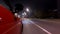 Drivelapse urban look from fast driving car at a night avenue in a city timelapse hyperlapse