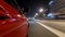 Drivelapse urban look from fast driving car at a night avenue in a city timelapse hyperlapse