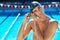 Driven to sporting excellence. Cropped portrait of a handsome male swimmer getting ready to compete.