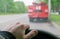 Driver hand on the steering wheel of the car