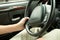 Driver holding steering wheel