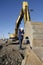 Driver inspecting his digger