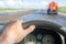 Driver overtaking a fuel truck on the highway