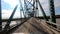 Driver POV Crossing the Mississippi River on a Steel Deck Bridge