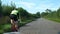 Driver pov shot overtaking cyclist while driving on british countryside road in england