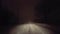 Driver Slips on Slippery Dangerous Road in Snow Blizzard on Rural Road at Night.  Driver Point of View POV Slipping on Icy Street