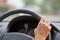 Drivers\'s hands on a stearing wheel