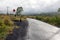 Driving across the caldera ridge road among view of extinct crater of the volcano Batur