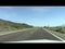 Driving Along Desert Highway