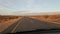 Driving along a tar highway in the Northern Cape of South Africa