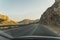 driving around Crete Island, road to Calypso Pirate Fjord, car on a rocky road