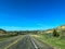 Driving through the badlands hills and mountains in Theodore Roosevelt National Park in North Dakota