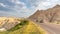 Driving through Badlands National Park on the Scenic Loop.