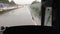 Driving with a bus through the rain on the autobahn