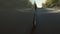 Driving a car is a country road. Wheel spinning POV
