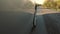 Driving a car is a country road. Wheel spinning POV