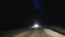 Driving car at night road in winter, snow, slippery blizzard weather mountains forest