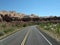 Driving by car through sedimentary rock in the desert