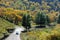 Driving in colorful autumn hill