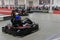 Driving an electric kart at an indoor race track